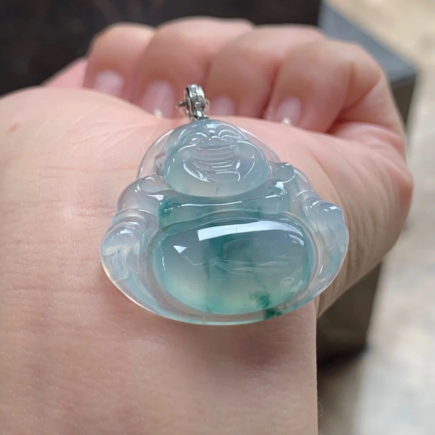 冰种飘花坐佛
清爽 金扣