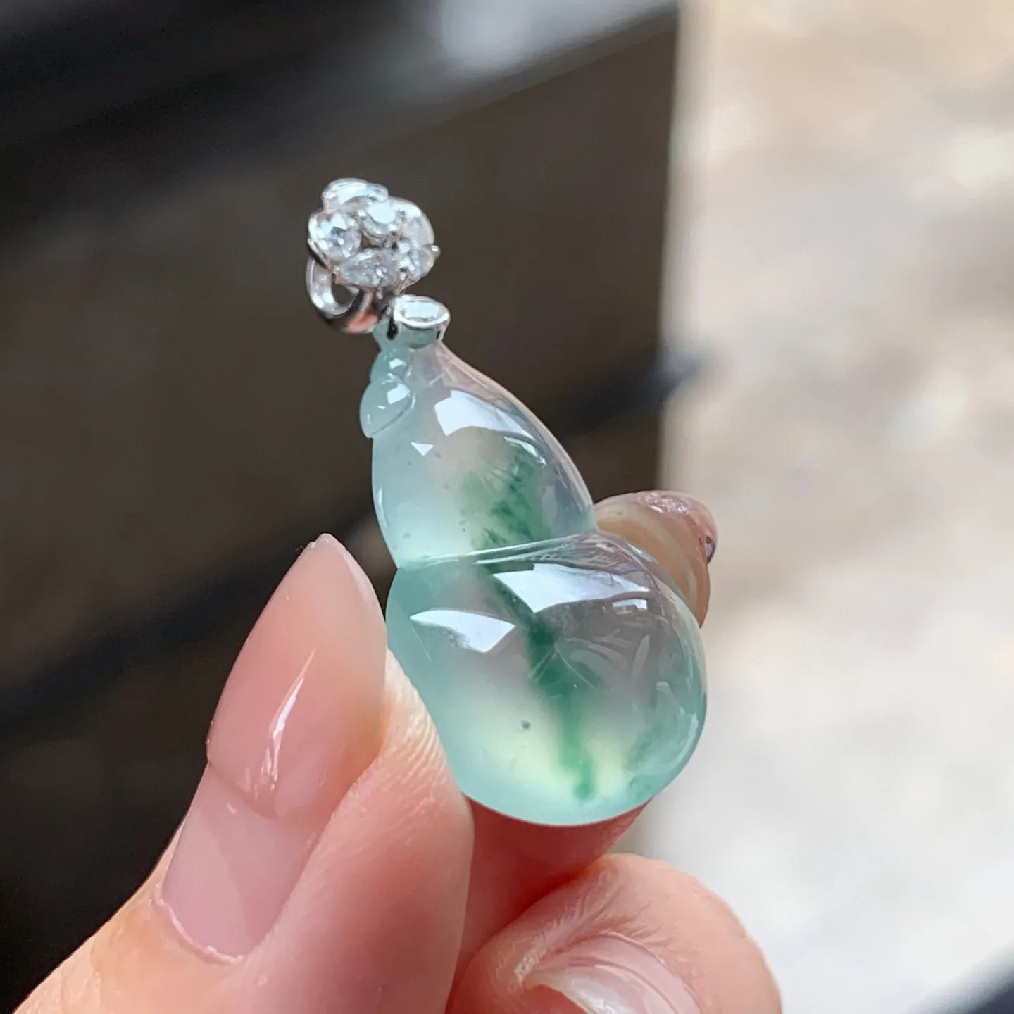 冰种飘花葫芦
清爽 金扣
