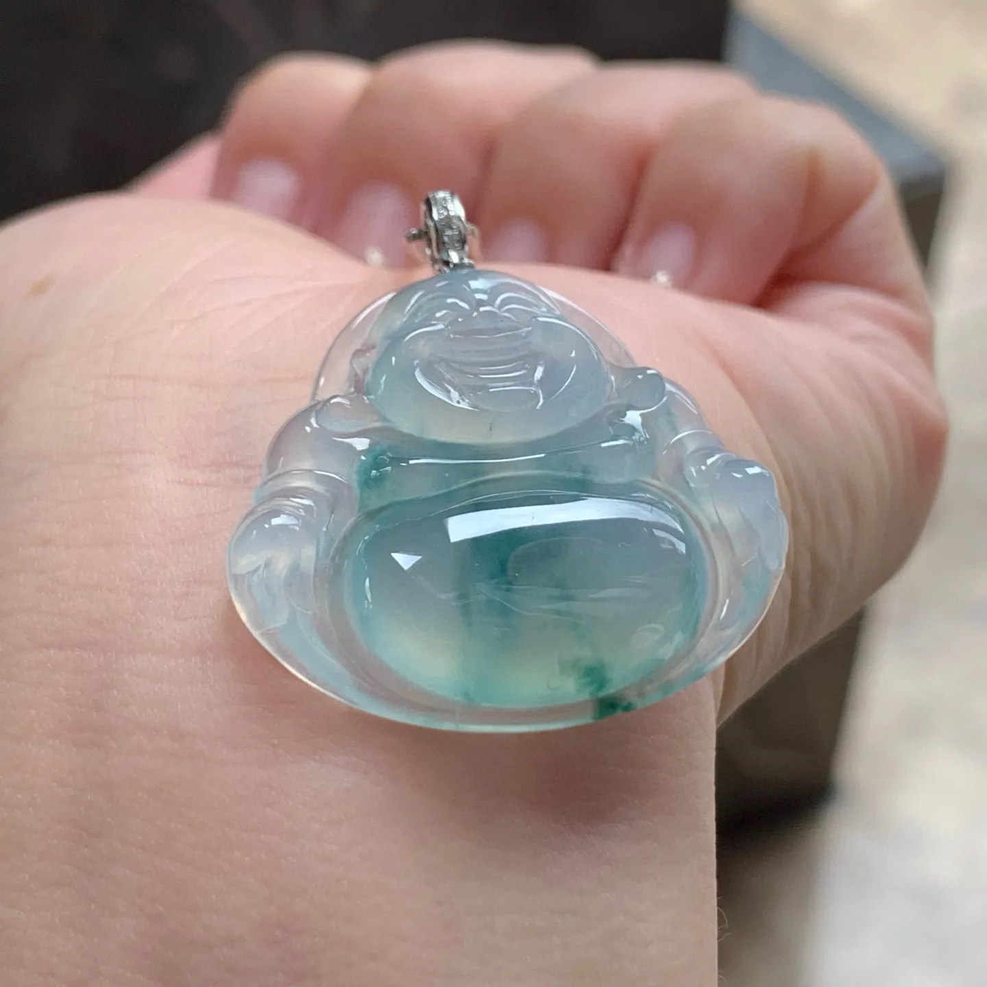 冰种飘花坐佛
清爽 金扣
