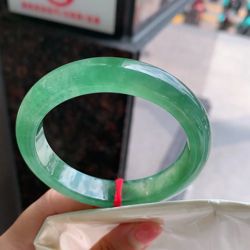 正圈冰玻啤酒绿 无瑕 尺寸:55.8/12.2/8.4 种色俱佳
