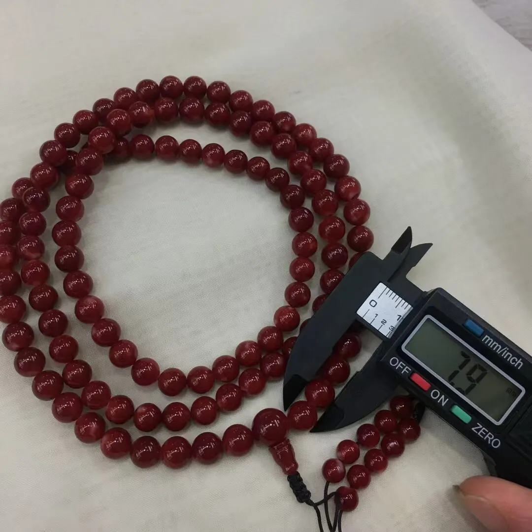 【天然日本阿卡牛血红珊瑚8mm大圆珠108粒佛珠链】项链手链两用款！️遇不可求！日本产地，阿卡材料，牛血红颜色，光泽柔润透亮，直径约7.9-7.1mm，重量69.46克，珊瑚本为佛教珍宝，来自深海千年生长，有生长纹，属于有机宝石，气场强大，稀少珍贵！每粒均为天然无添加无修补！少虫眼少白芯！收藏精品！传承宝贝！