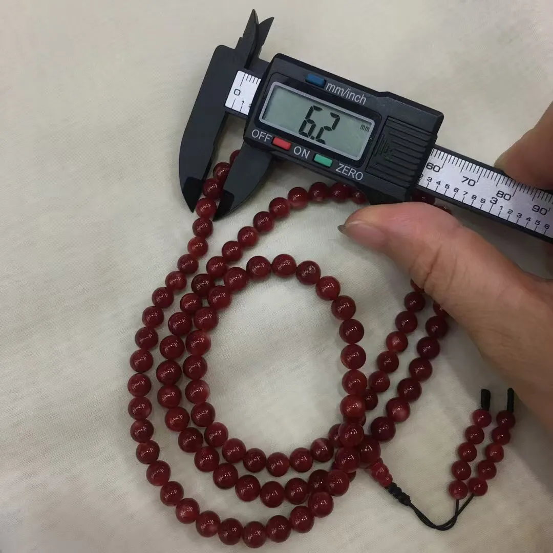 【天然日本阿卡牛血红珊瑚7mm圆珠108粒佛珠链】项链手链两用款！️遇不可求！日本产地，阿卡材料，牛血红颜色，光泽柔润透亮，直径约6.9-6.2mm，重量44.64克，珊瑚本为佛教珍宝，来自深海千年生长，有生长纹，属于有机宝石，气场强大，稀少珍贵！每粒均为天然无添加无修补！少虫眼少白芯！收藏精品！传承宝贝！