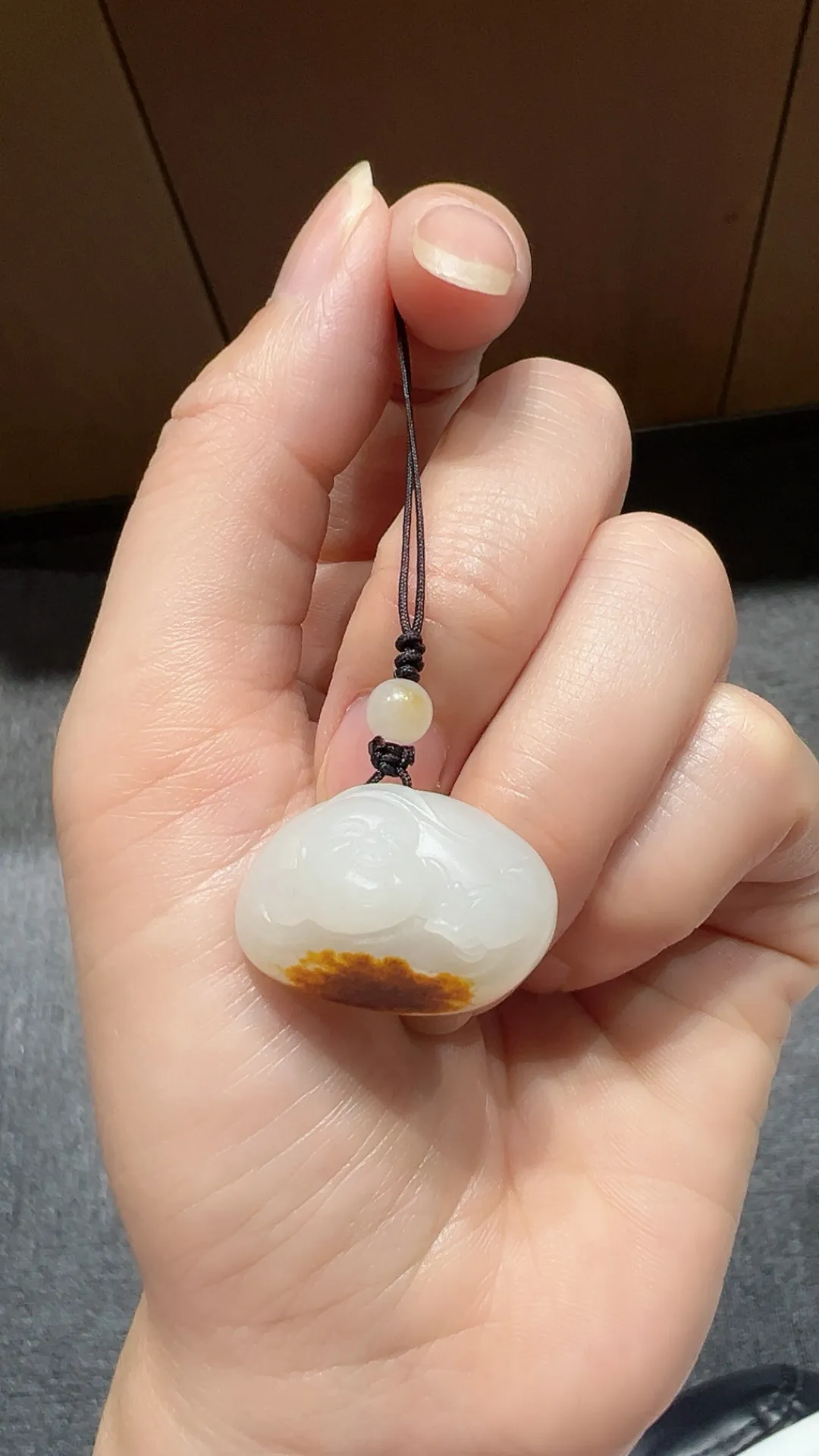 籽料｜枣红皮弥勒佛

重9.7克 尺寸20*26*12.8m m