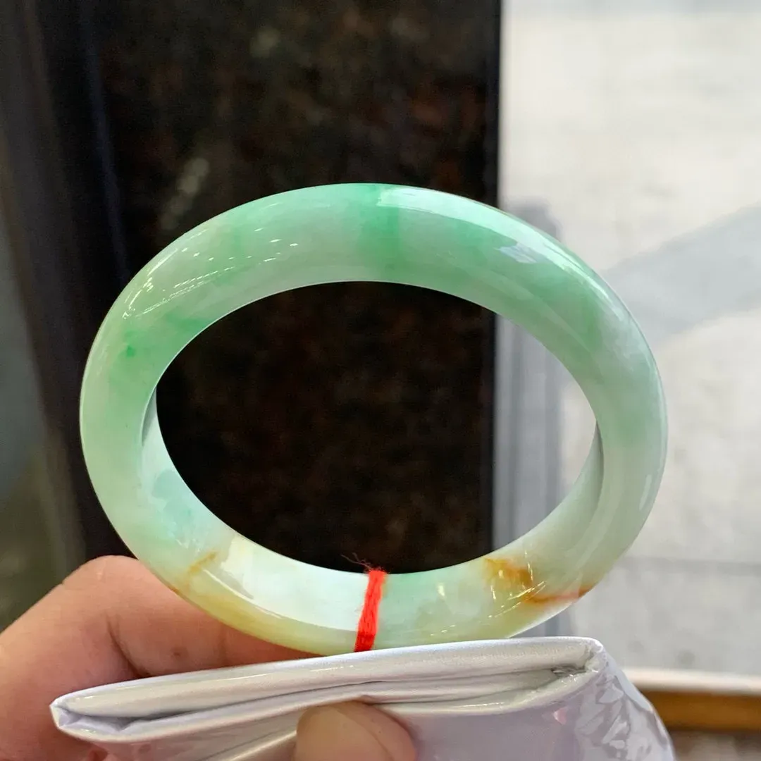 正圈冰糯黄加绿 无瑕 尺寸:56.5/12.5/8.4 超值
