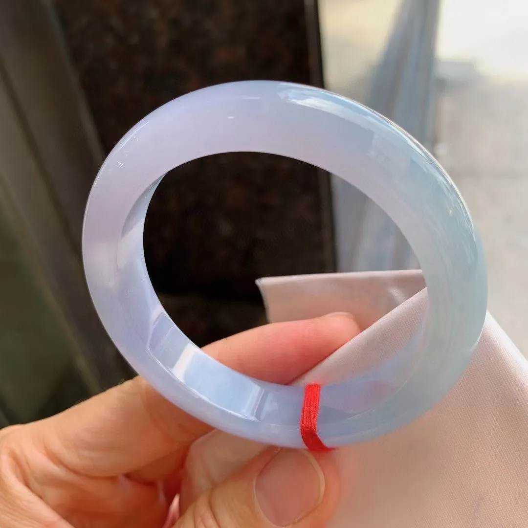 紫罗兰正圈
尺寸：55.1-12.8-8.8 
紫底浓郁，底色均匀，种水很好，晶体细，卖相不错，上手效果好