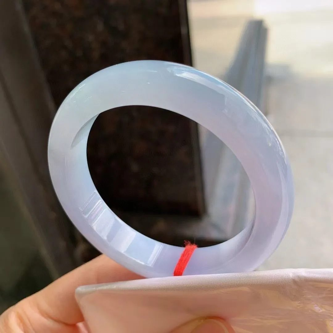 紫罗兰正圈
尺寸：55.1-12.8-8.8 
紫底浓郁，底色均匀，种水很好，晶体细，卖相不错，上手效果好