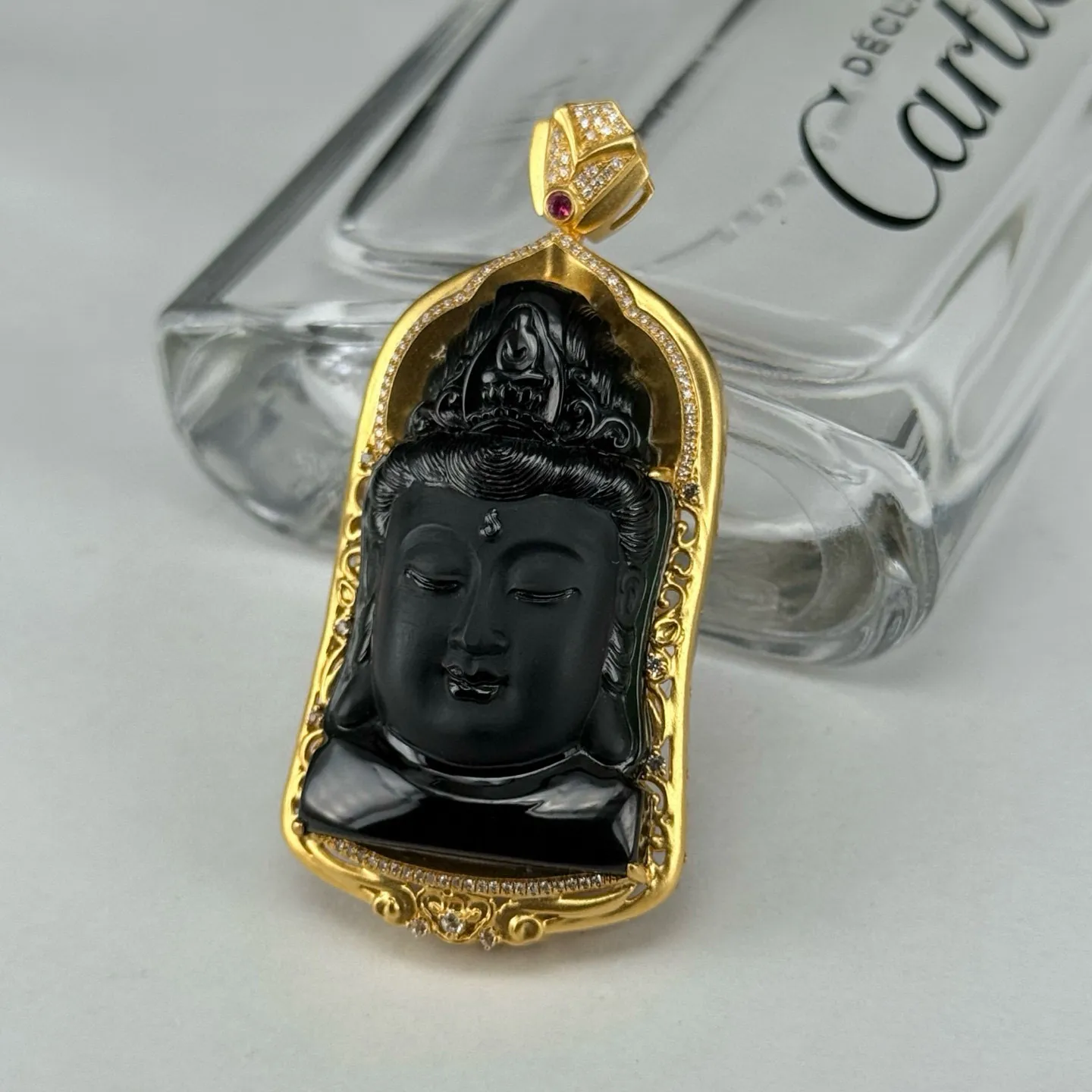 精品18k墨翠观音头 种好色正 黑度极好 打灯通透 油性十足 尺寸55.5