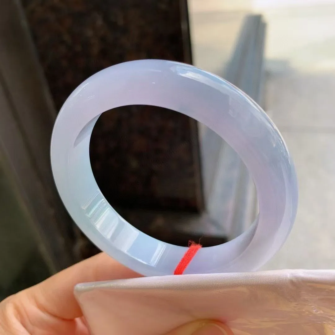 紫罗兰正圈
尺寸：55.1-12.8-8.8 
紫底浓郁，底色均匀，种水很好，晶体细，卖相不错，上手效果好