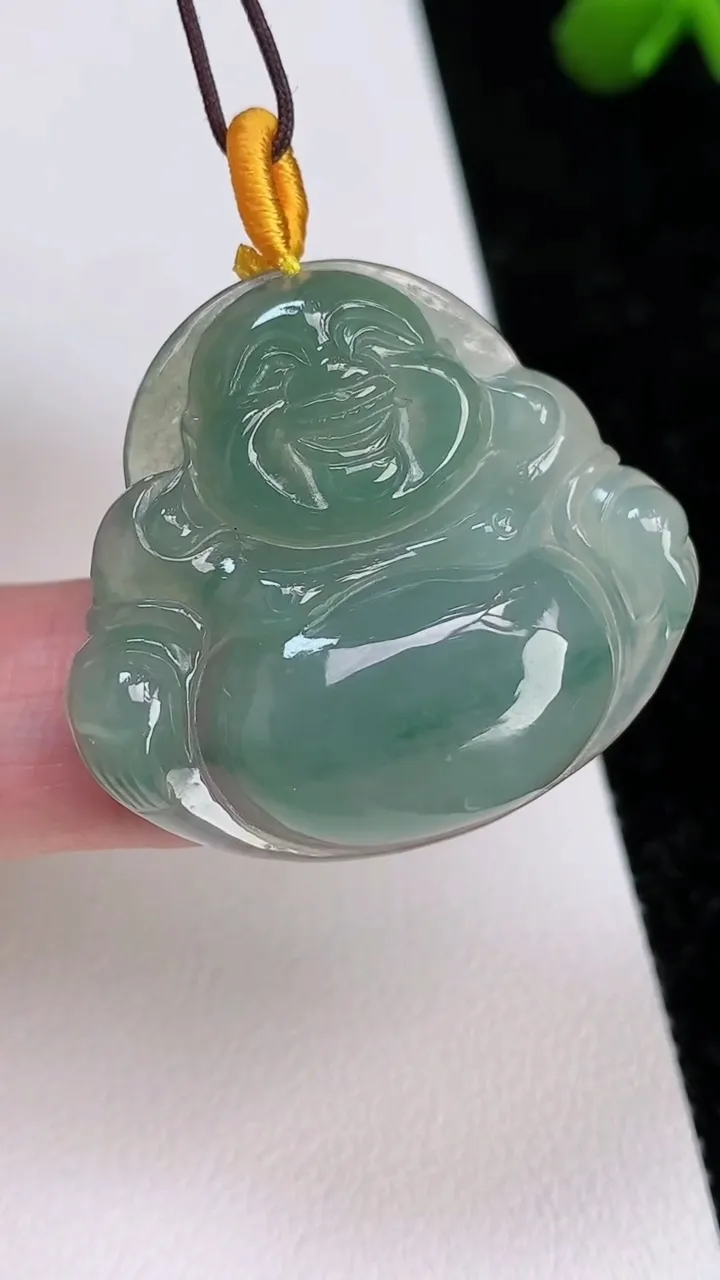 天然A货翡翠飘花佛公吊坠，尺寸30.7-34.2-6，重量:9.65g
7月1日
