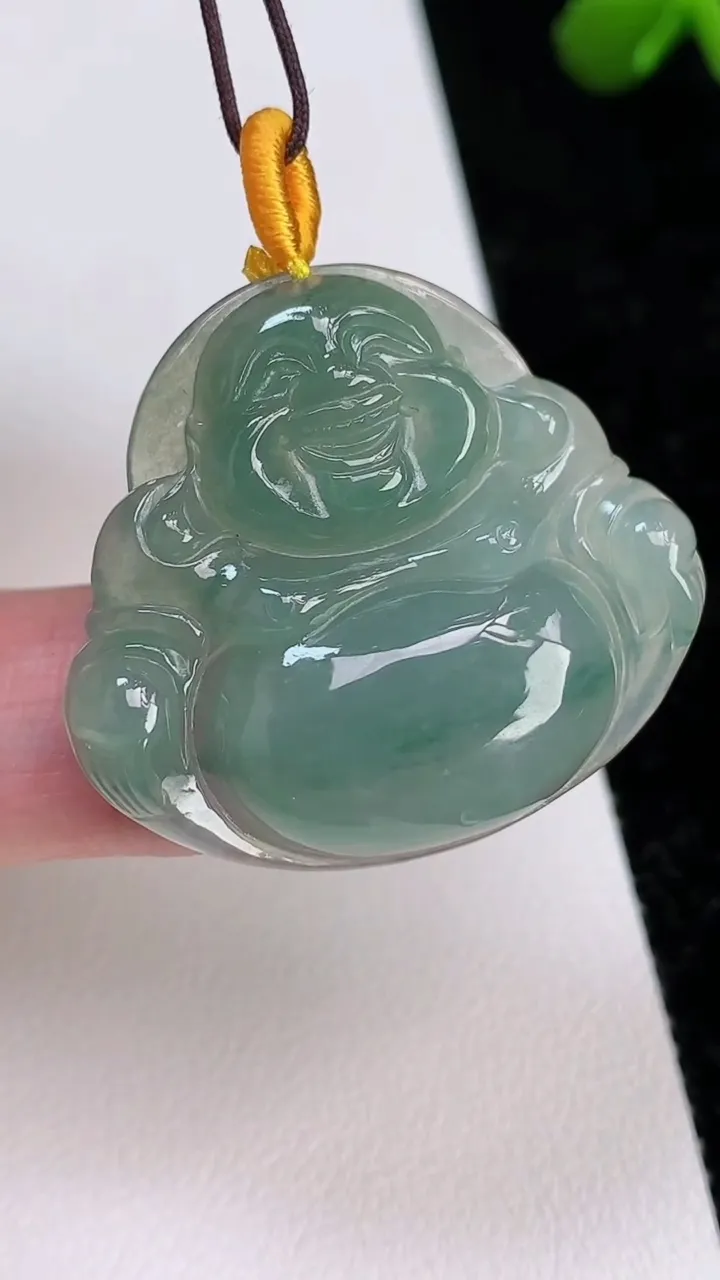 天然A货翡翠飘花佛公吊坠，尺寸30.7-34.2-6，重量:9.65g
7月1日