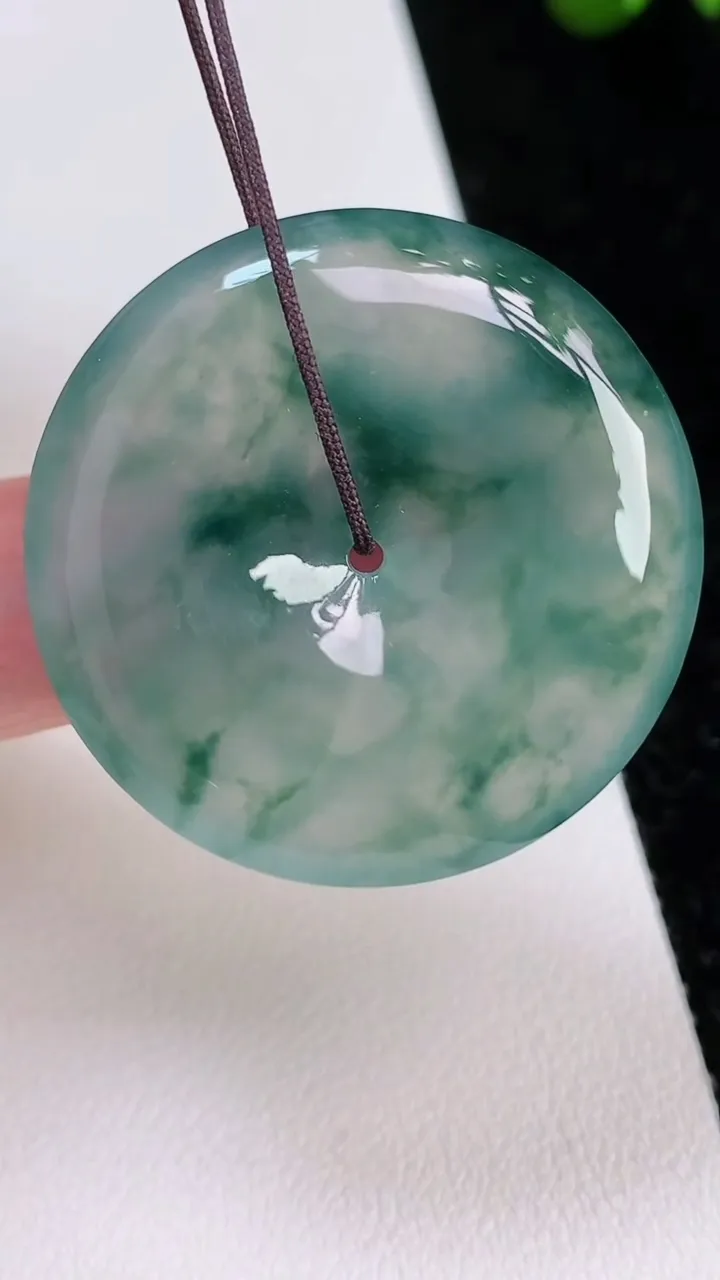天然A货翡翠种飘花平安扣吊坠，尺寸34.4-6.2，重量:15.33g
7月2日