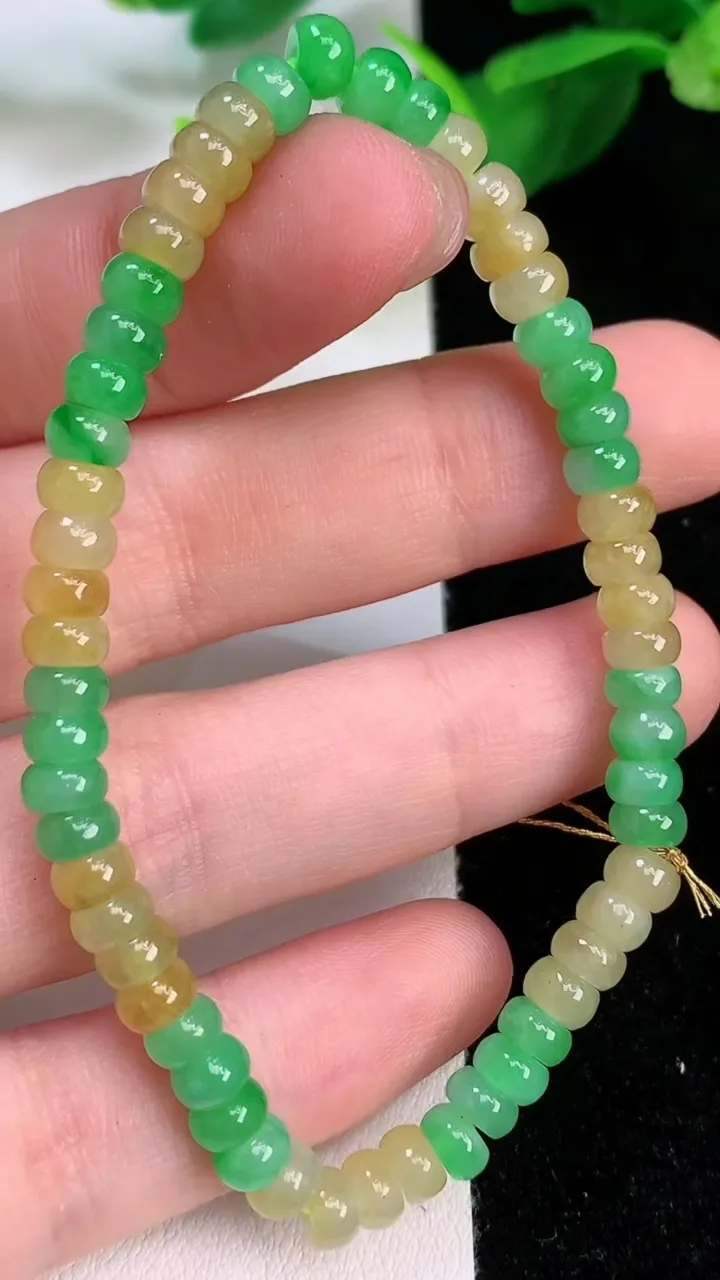 天然A货翡翠双彩算盘珠手串，尺寸5-2.7，重量:9.33g7月9日
工厂直销收藏佳品,种好水足，色