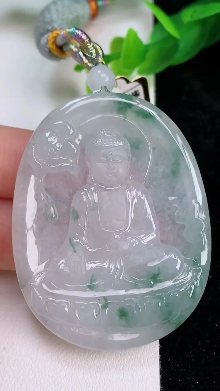 天然A货翡翠飘花阿弥陀佛吊坠，尺寸53.7-42.3-6.3，重量:30.00g
7月10日