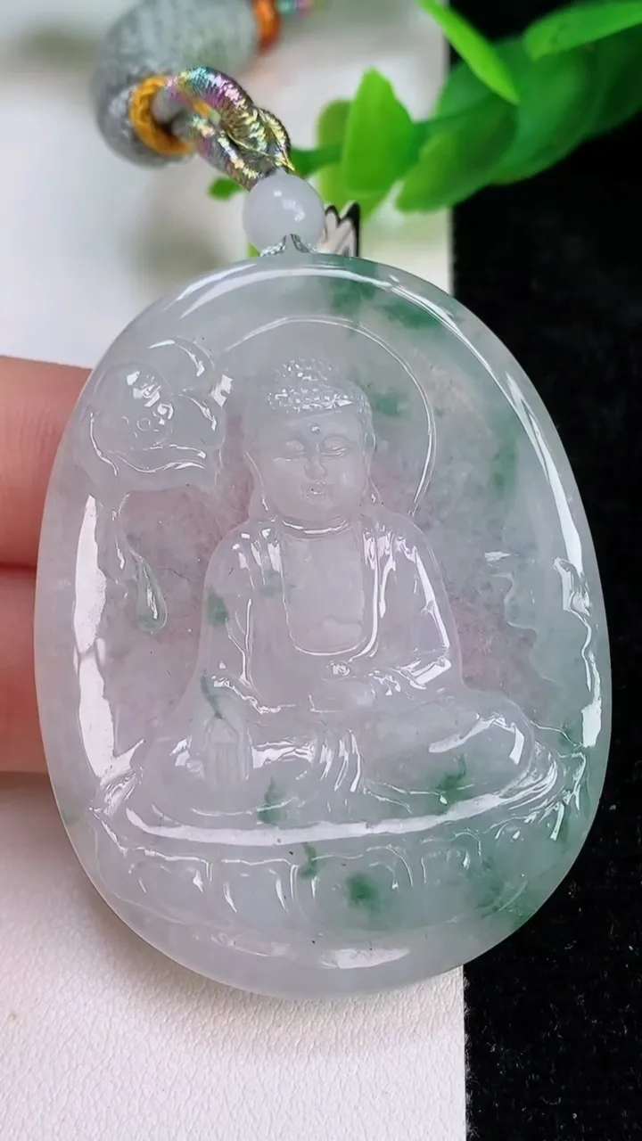 天然A货翡翠飘花阿弥陀佛吊坠，尺寸53.7-42.3-6.3，重量:30.00g
7月10日