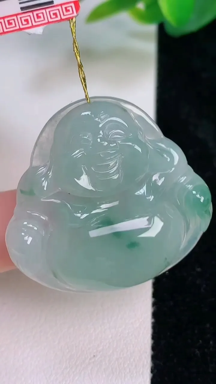 天然A货翡翠飘花佛公吊坠，尺寸33.7-35.7-6.2，重量:11.32g
7月17日