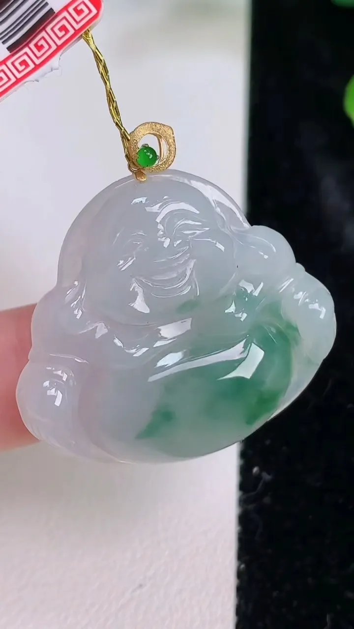 天然A货翡翠种飘花佛公吊坠，尺寸28.5-31.4-5.6，重量:7.14g
7月27日
