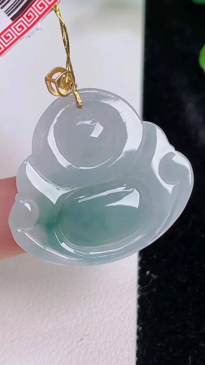天然A货翡翠种飘花佛公吊坠，尺寸28.5-31.4-5.6，重量:7.14g
7月27日