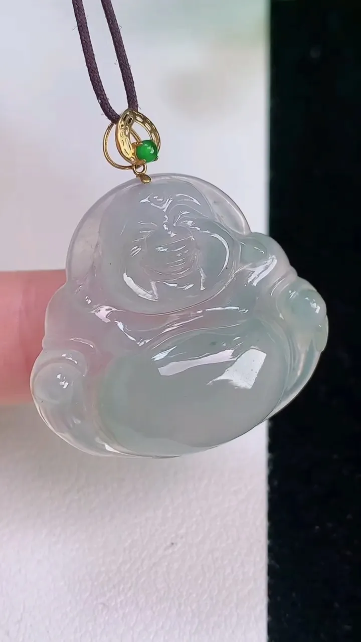 天然A货翡翠种飘花佛公吊坠，尺寸27.6-30.4-5.8，重量:7.45g
7月30日