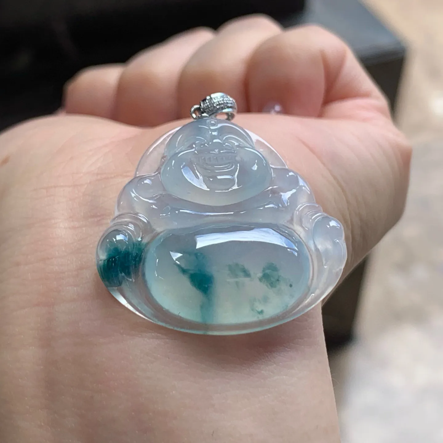 冰种飘花坐佛
清爽 金扣