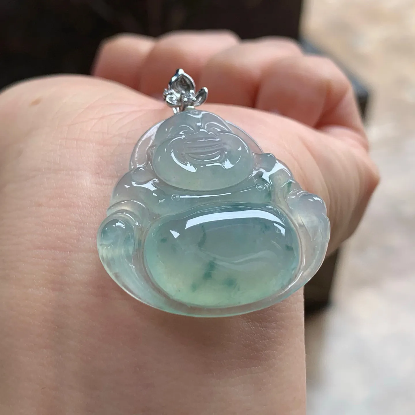 冰种飘花坐佛
清爽 金扣