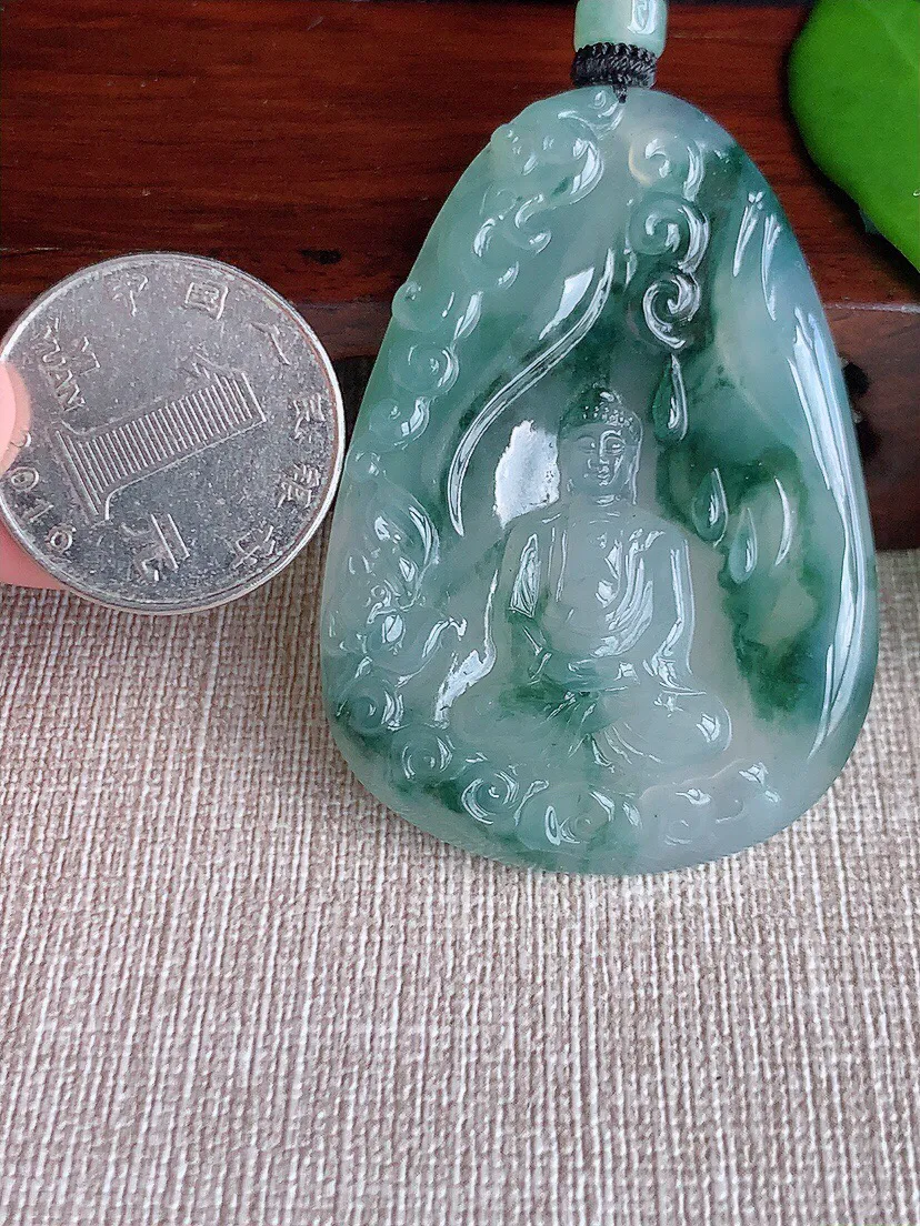 a货翡翠老坑冰种飘花大日如来吊坠 尺寸53.7×37.5×5mm 重量27.60g 0708