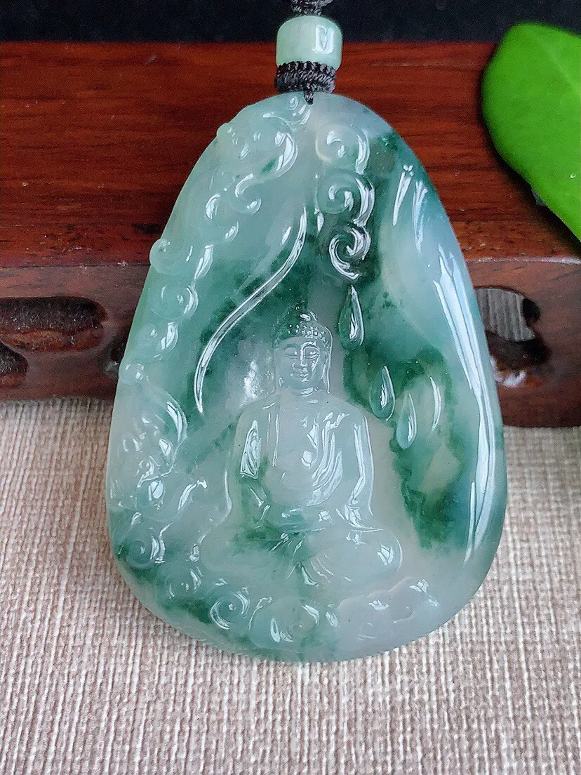 a货翡翠老坑冰种飘花大日如来吊坠 尺寸53.7×37.5×5mm 重量27.60g 0708
