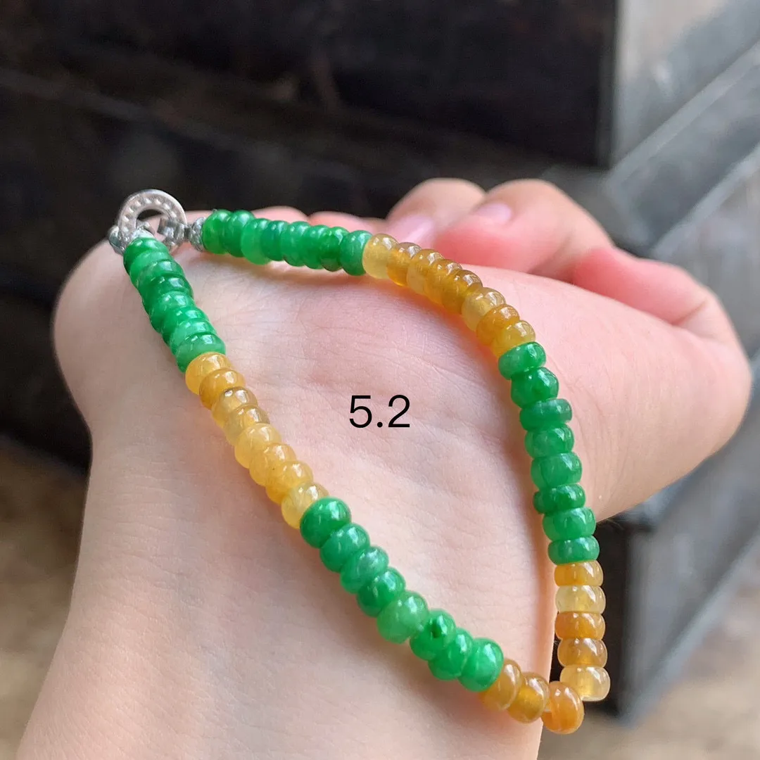 黄加绿算盘珠手串

尺寸5.2