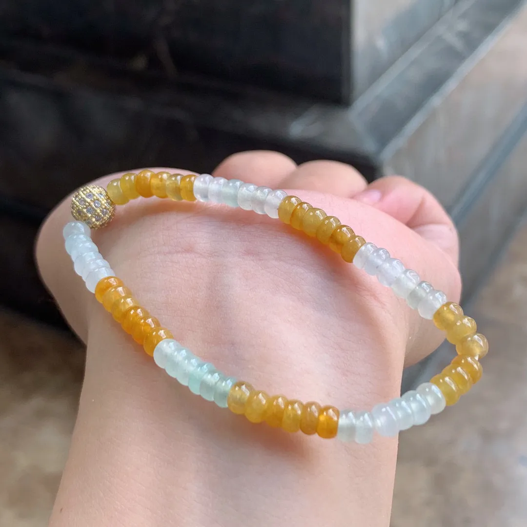 拼色算盘珠手串
黄+白

尺寸5