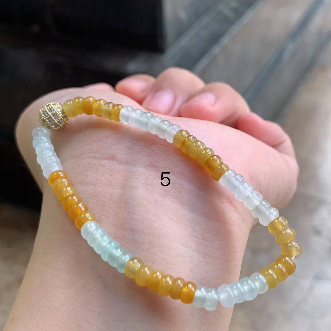 拼色算盘珠手串
黄+白

尺寸5
