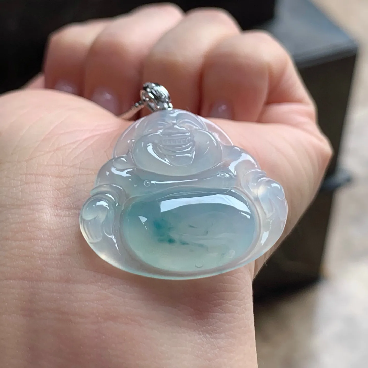 冰种飘花坐佛
清爽 金扣