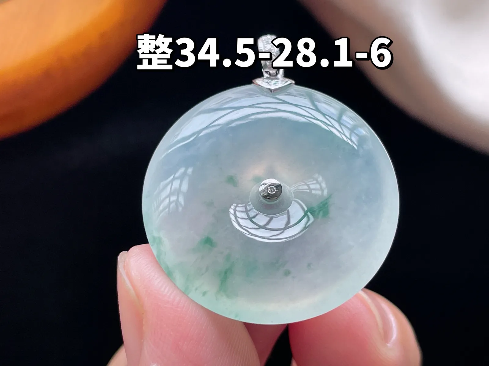 18K 冰种飘花·平安扣

整34.5-28.1-6