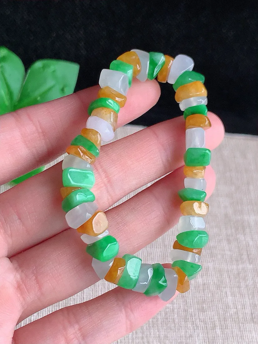 a货翡翠老坑冰种三彩随形手串 尺寸8.5×4.5×6.6mm 重量21.08g 0714