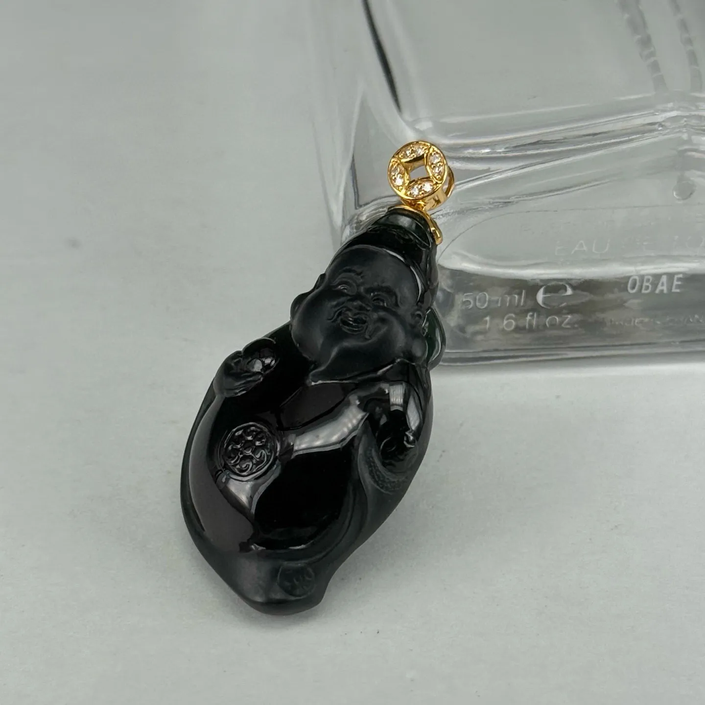 精品18k叩头墨翠小财神 种好色正 黑度极好 打灯通透 油性十足