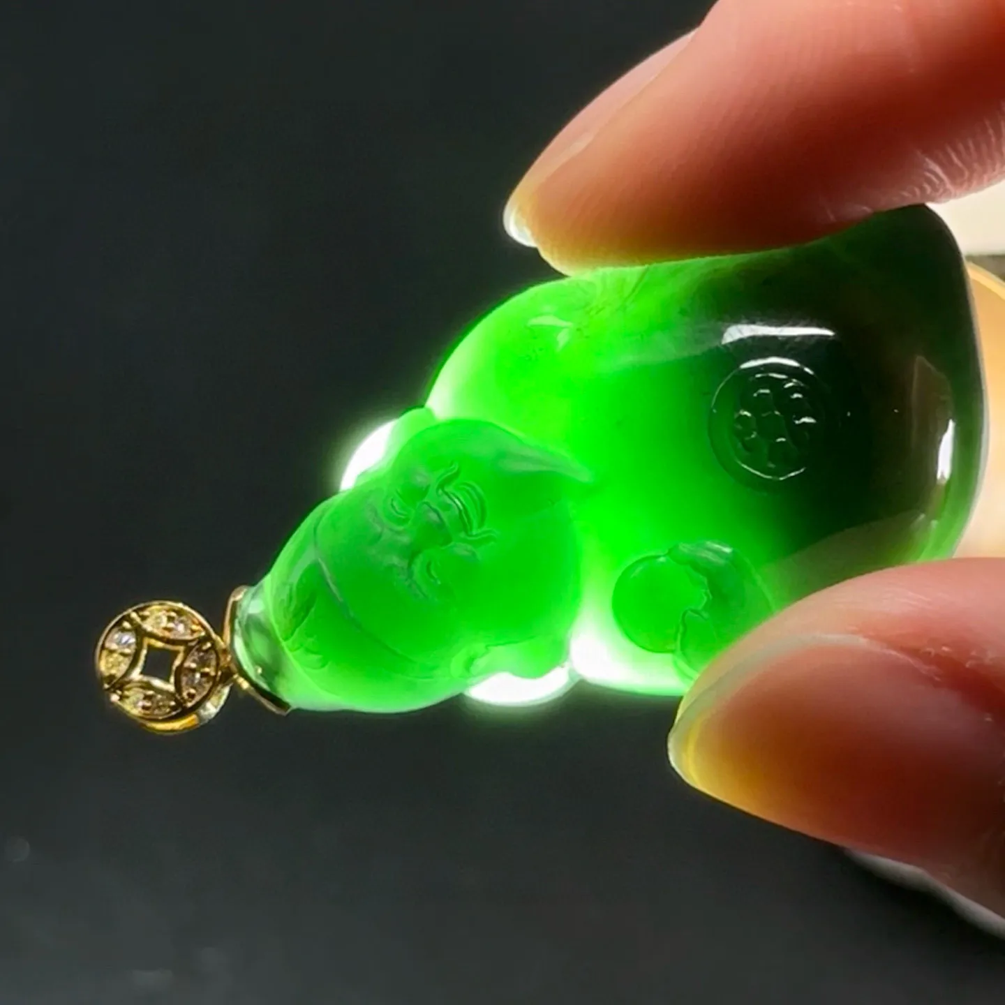 精品18k叩头墨翠小财神 种好色正 黑度极好 打灯通透 油性十足