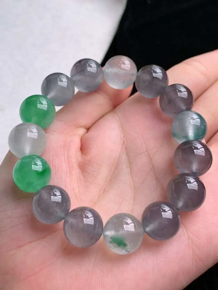 a货翡翠老坑高冰种飘绿乌鸡种圆珠佛珠手串15颗，尺寸13mm 重量60.48g 0909