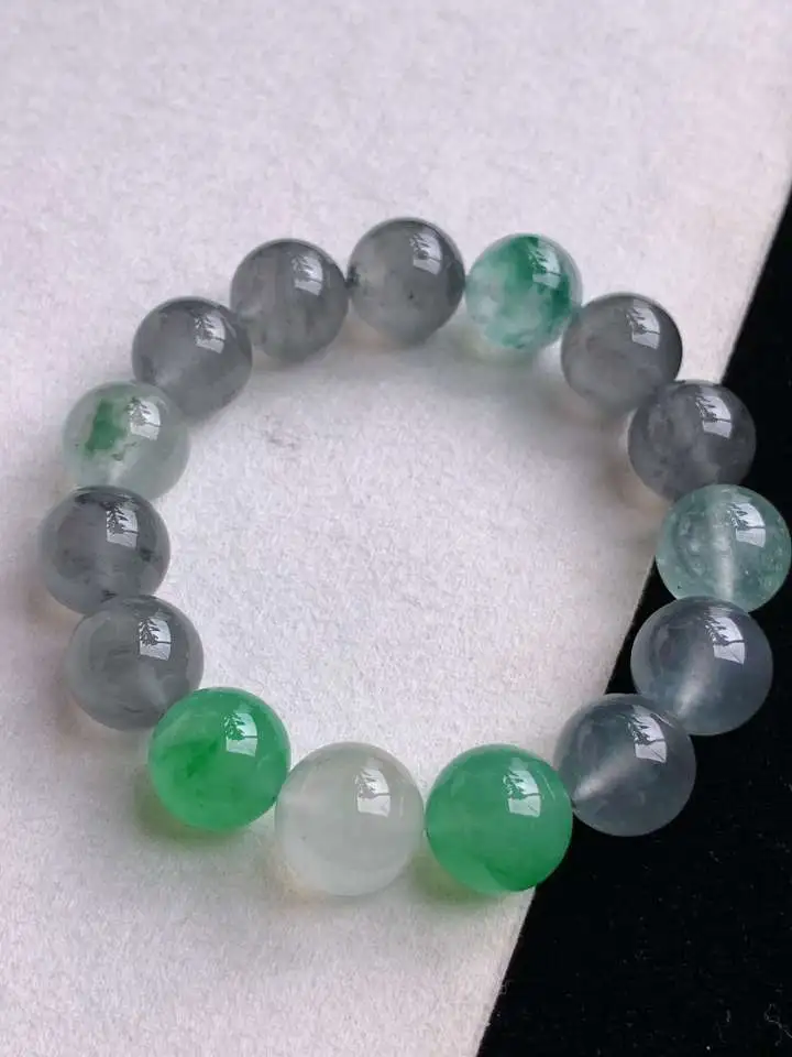 a货翡翠老坑高冰种飘绿乌鸡种圆珠佛珠手串15颗，尺寸13mm 重量60.48g 0909