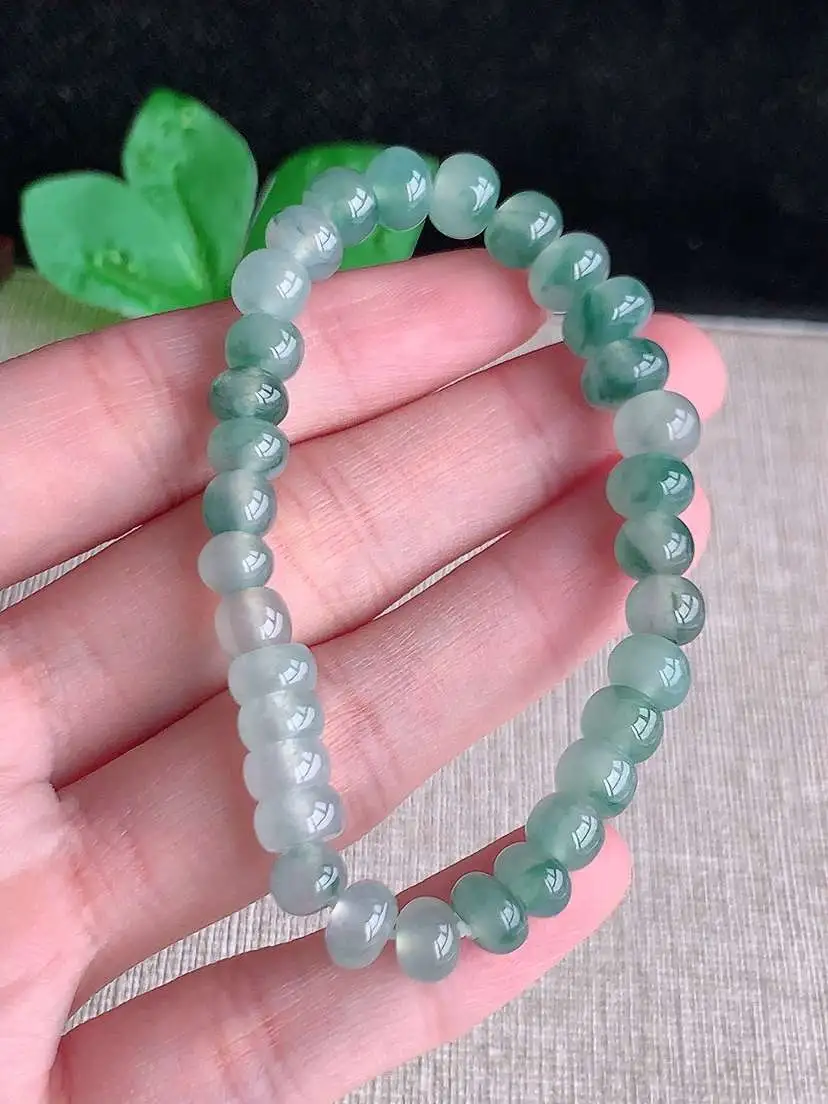 a货翡翠老坑冰种飘花算盘珠手串32颗  尺寸6.5×5.3mm 重量15.46g 0919