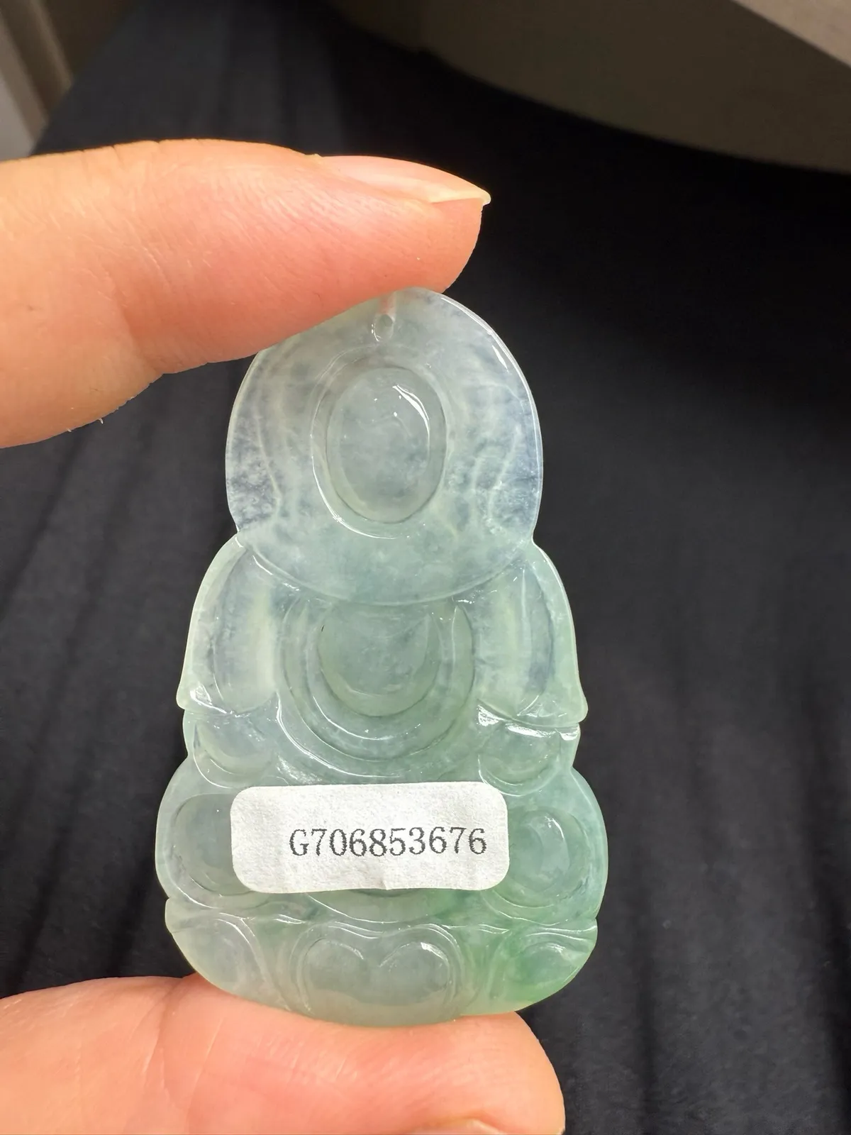 天然A货翡翠 观音（实物更美）
规格：54.1*32.6*6.8mm