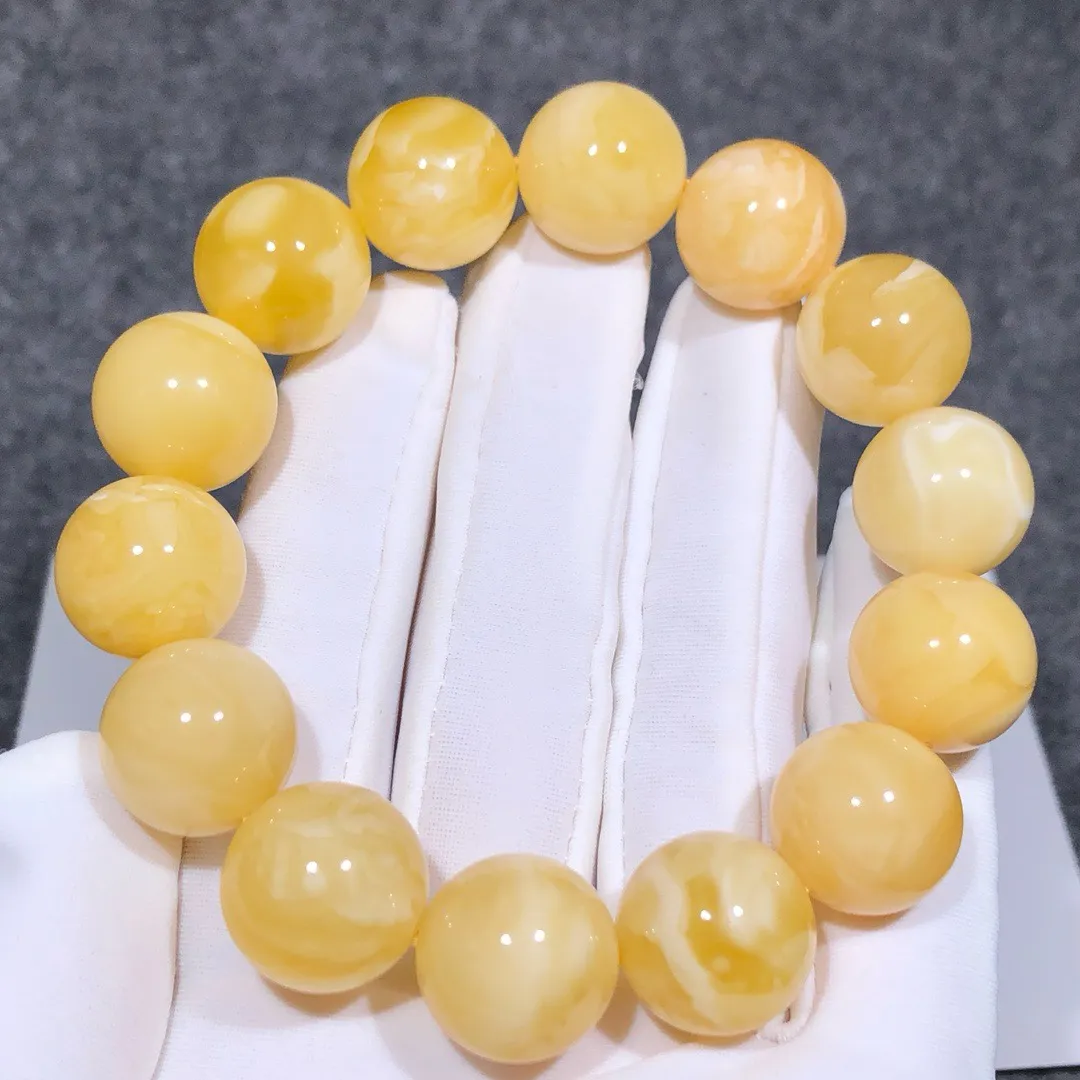 28.03克！15+精品黄白花蜡手串
黄白色鲜明、全品无瑕