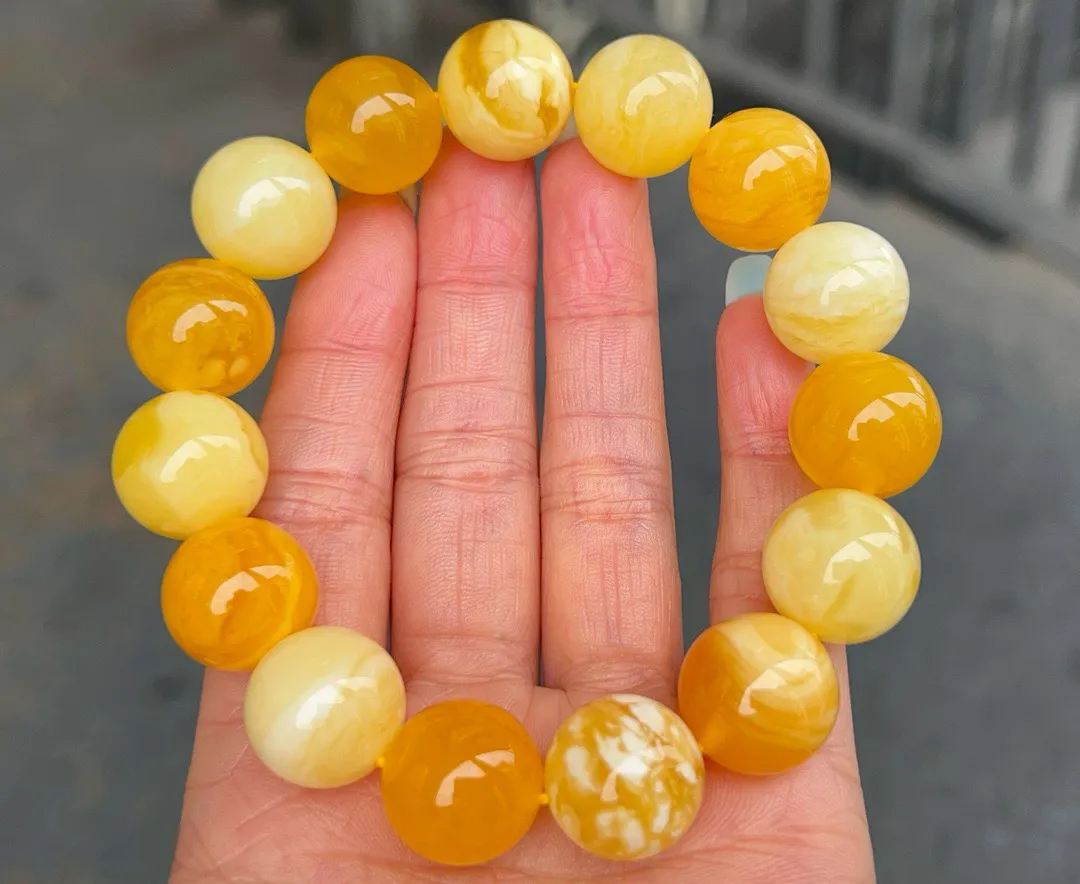 28.26克！15mm精品焦皮料多宝手串
色彩花纹很丰富、瓷白花、焦橘拉丝