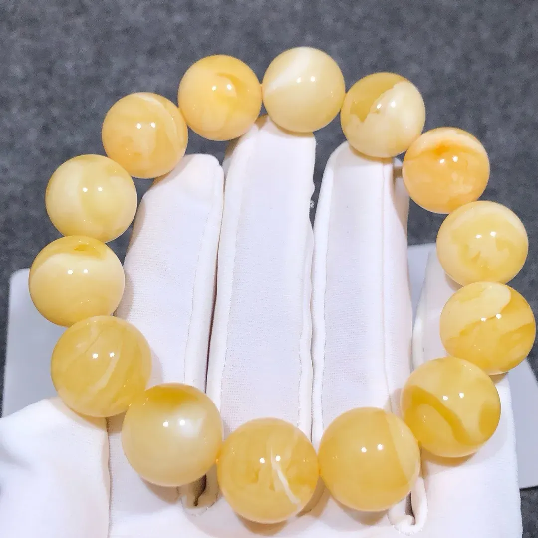 28.03克！15+精品黄白花蜡手串
黄白色鲜明、全品无瑕