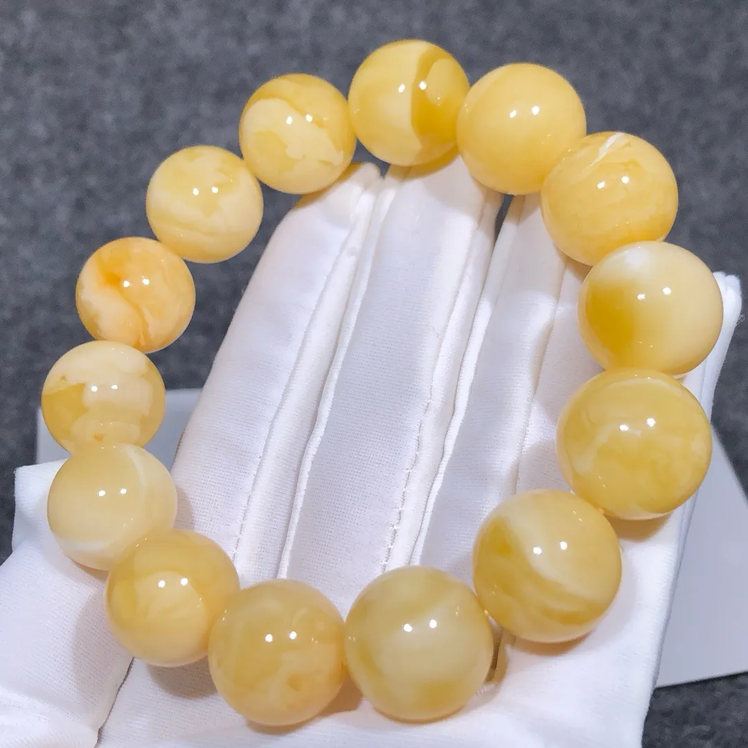 28.03克！15+精品黄白花蜡手串
黄白色鲜明、全品无瑕