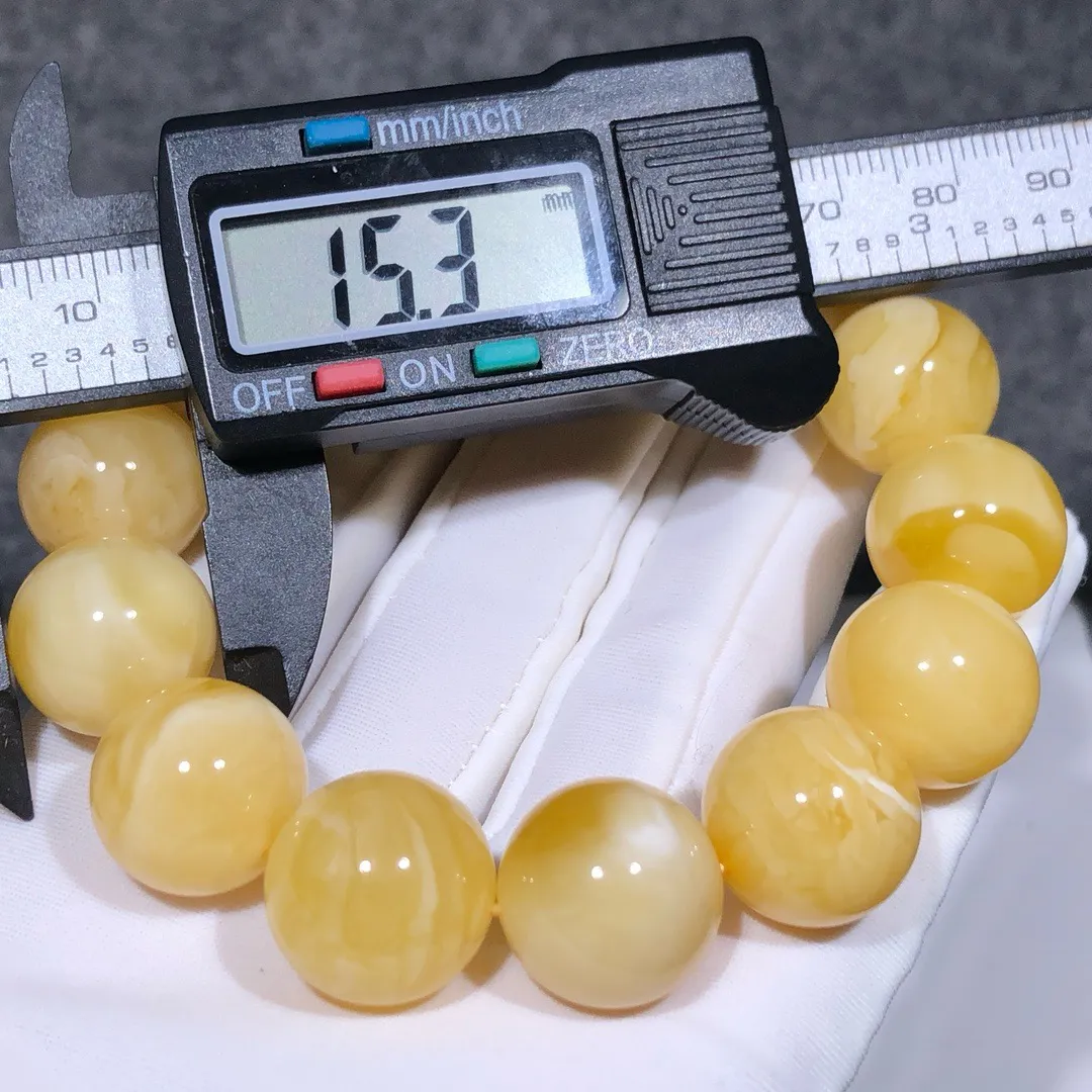 28.03克！15+精品黄白花蜡手串
黄白色鲜明、全品无瑕