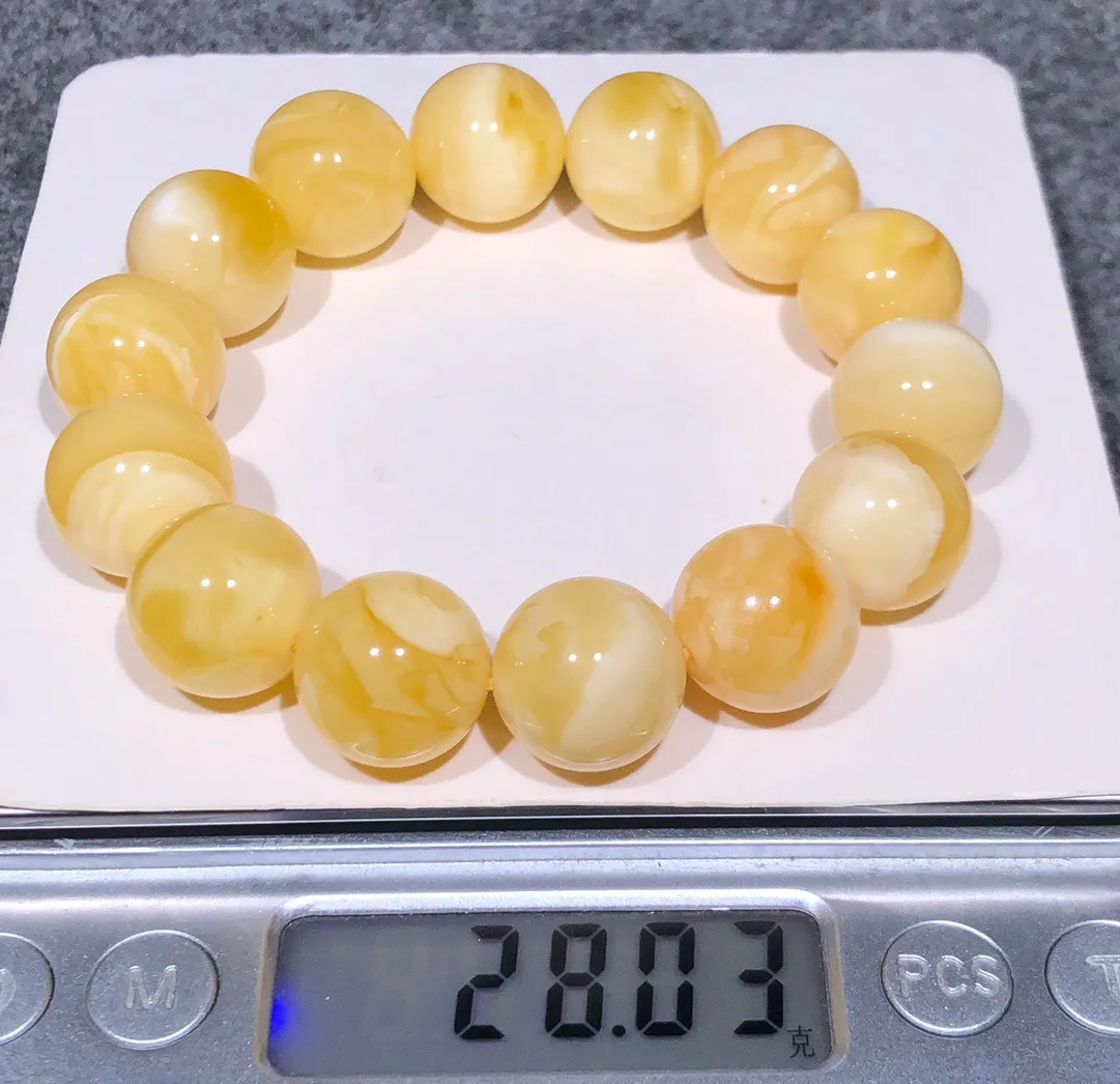 28.03克！15+精品黄白花蜡手串
黄白色鲜明、全品无瑕