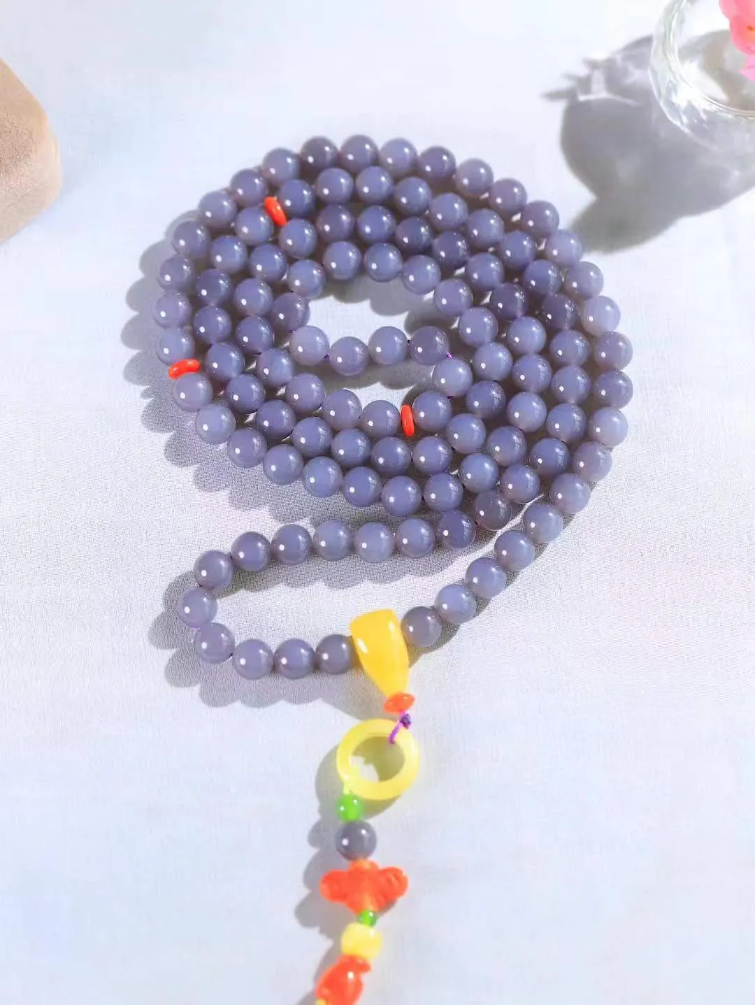 【链.108】

精品️和田玉烟紫圆珠挂链 玉质温润细腻 油性十足 佩戴舒适。珠珠落玉盘，间关莺语