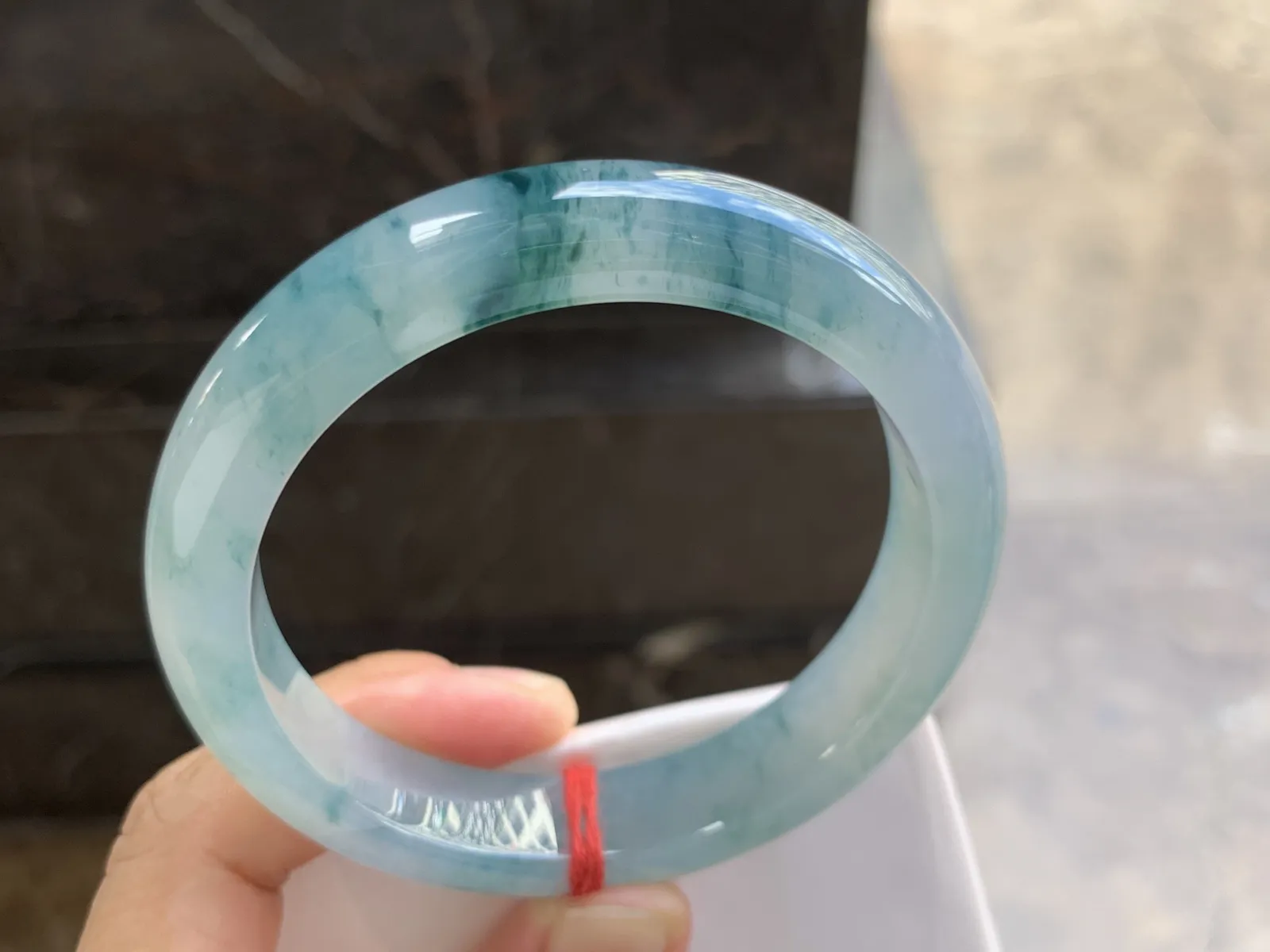 57.5-12.5-8.6mm
冰种蓝花手镯 水润光泽 透亮
