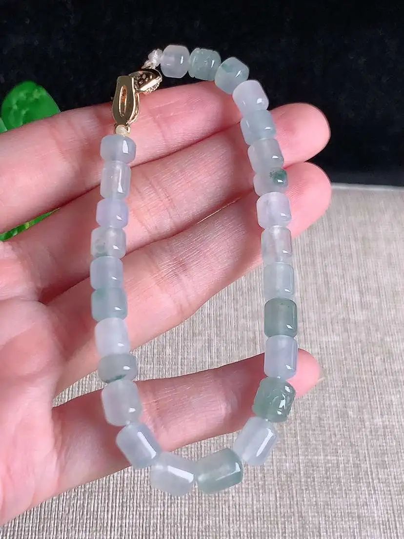 a货翡翠老坑冰种飘花路路通手串26颗  尺寸7.6×6mm 重量16.86g 1005