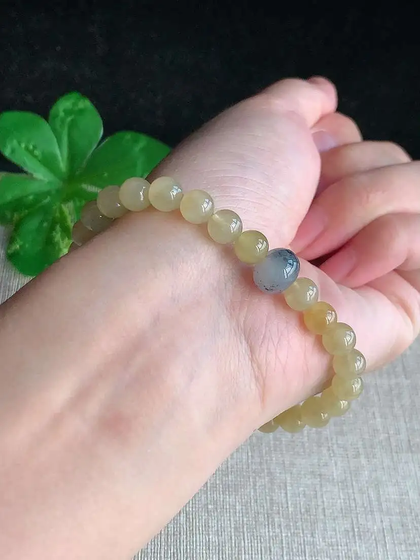 a货翡翠老坑冰种黄翡乌鸡种圆珠佛珠手串28颗 度高 尺寸6.3mm 重量14.45g 1014