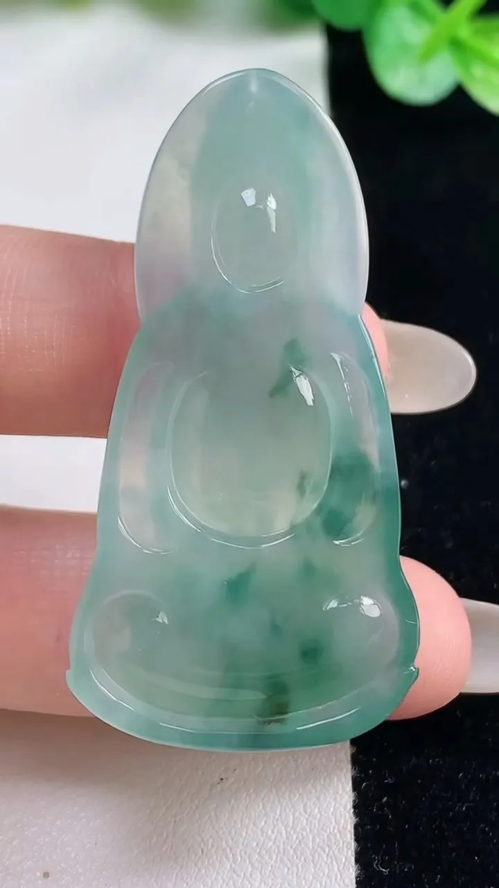 天然A货翡翠冰种飘花素衣观音吊坠，尺寸50-24.8-5.6，重量:12.01g
10月23日