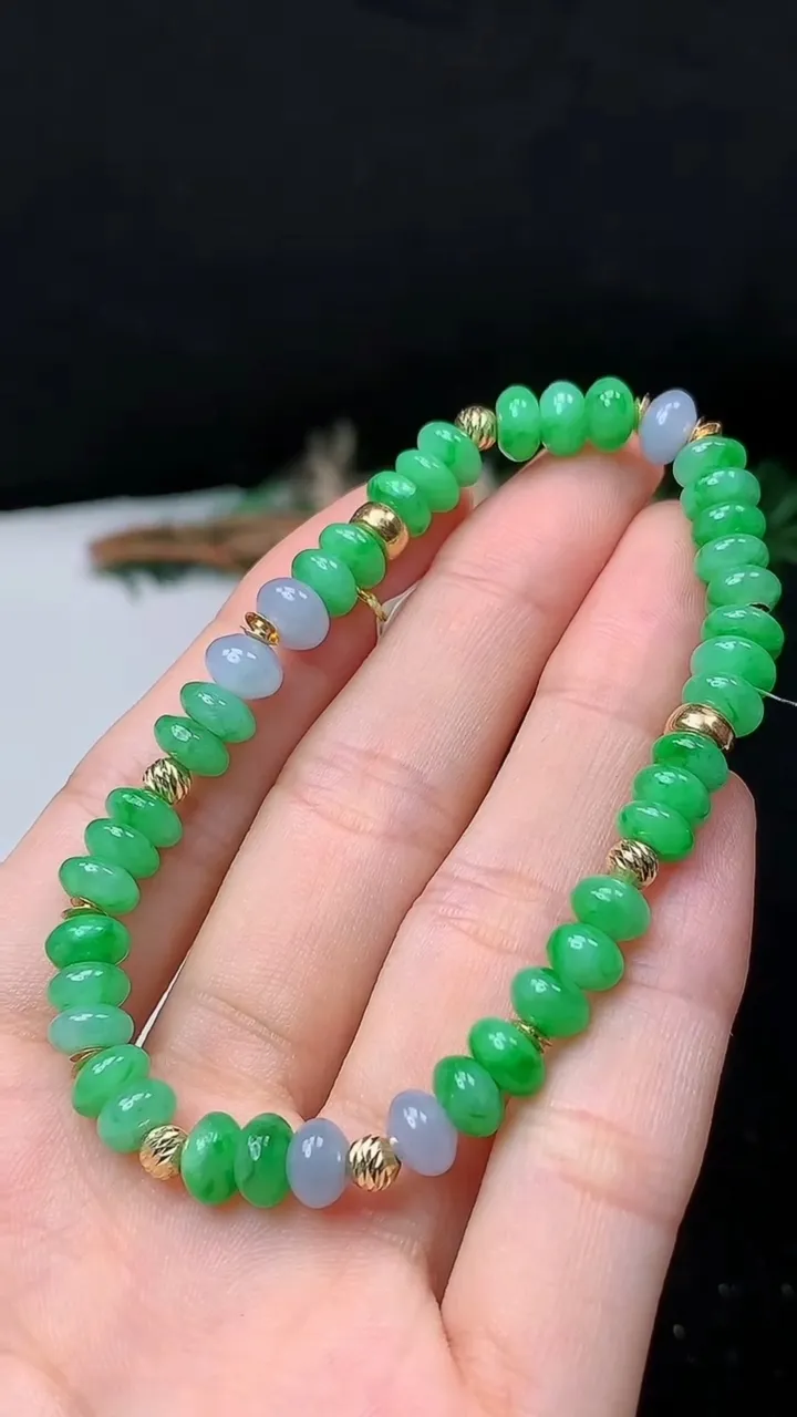 天然A货翡翠k金双彩算盘珠手串，尺寸6.6-4-41颗，重量:12.18g10月24日
工厂直销收藏